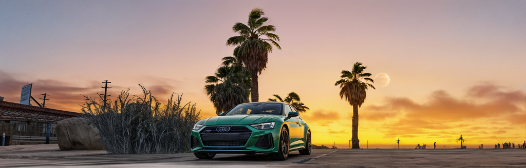 Grüner Audi vor Palmen im Sonnenuntergang